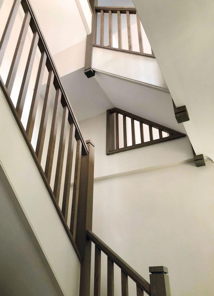 Elegant Staircase With Dusted Oak Spindles | Neville Johnson